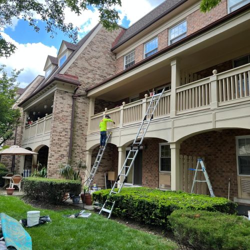 Home renovation experts installing new kitchen tiles